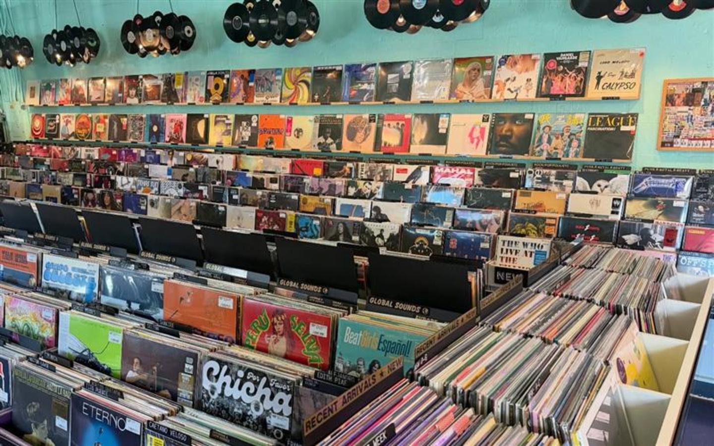 Turn Up the Pride: Free Rainbow Can Cooler at Sweat Records This