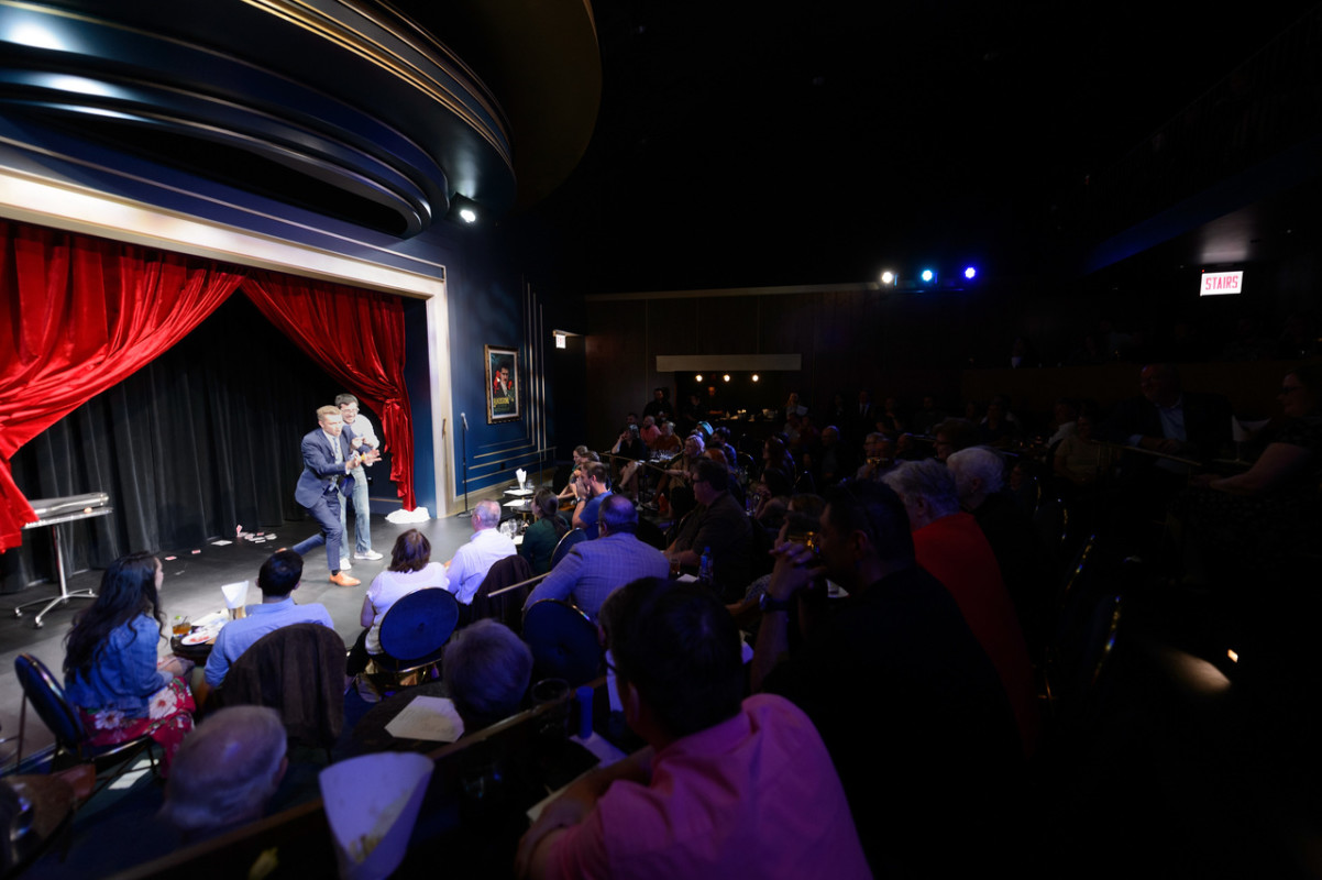 Magician on stage at Chicago Magic Lounge