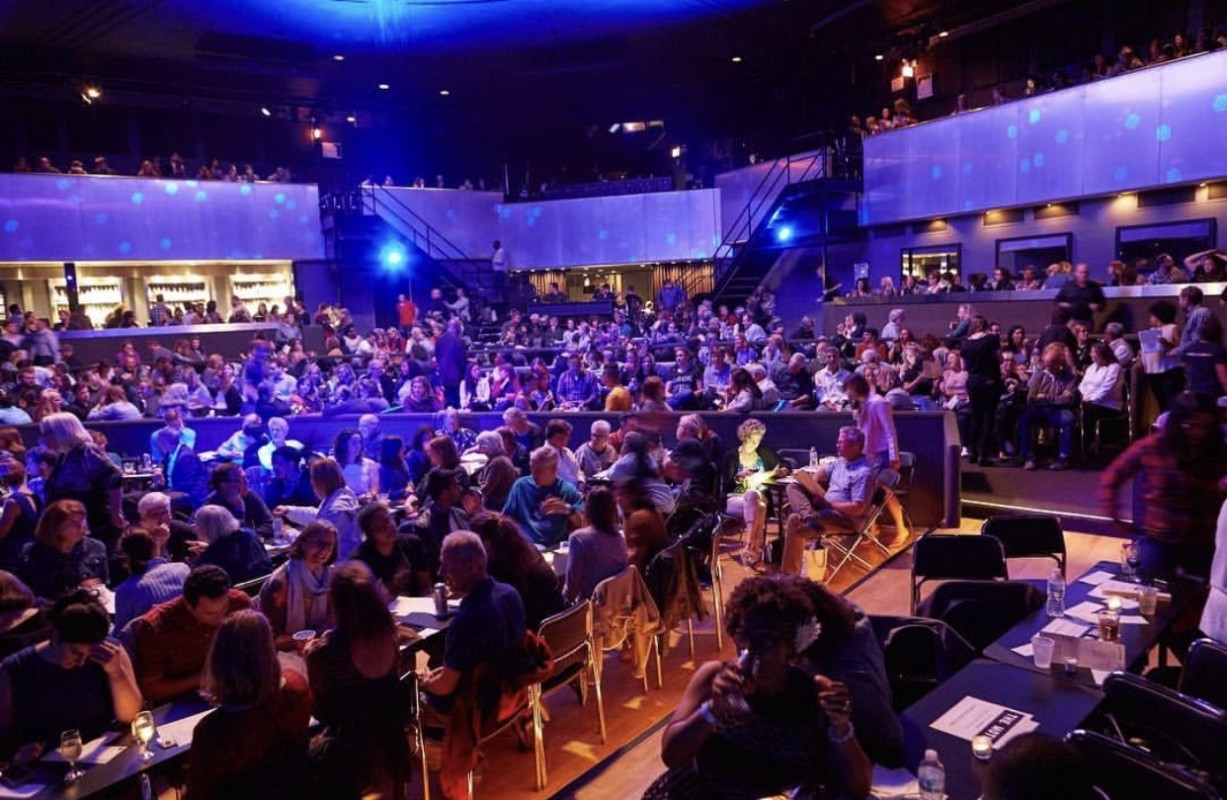 Seated performance with audience