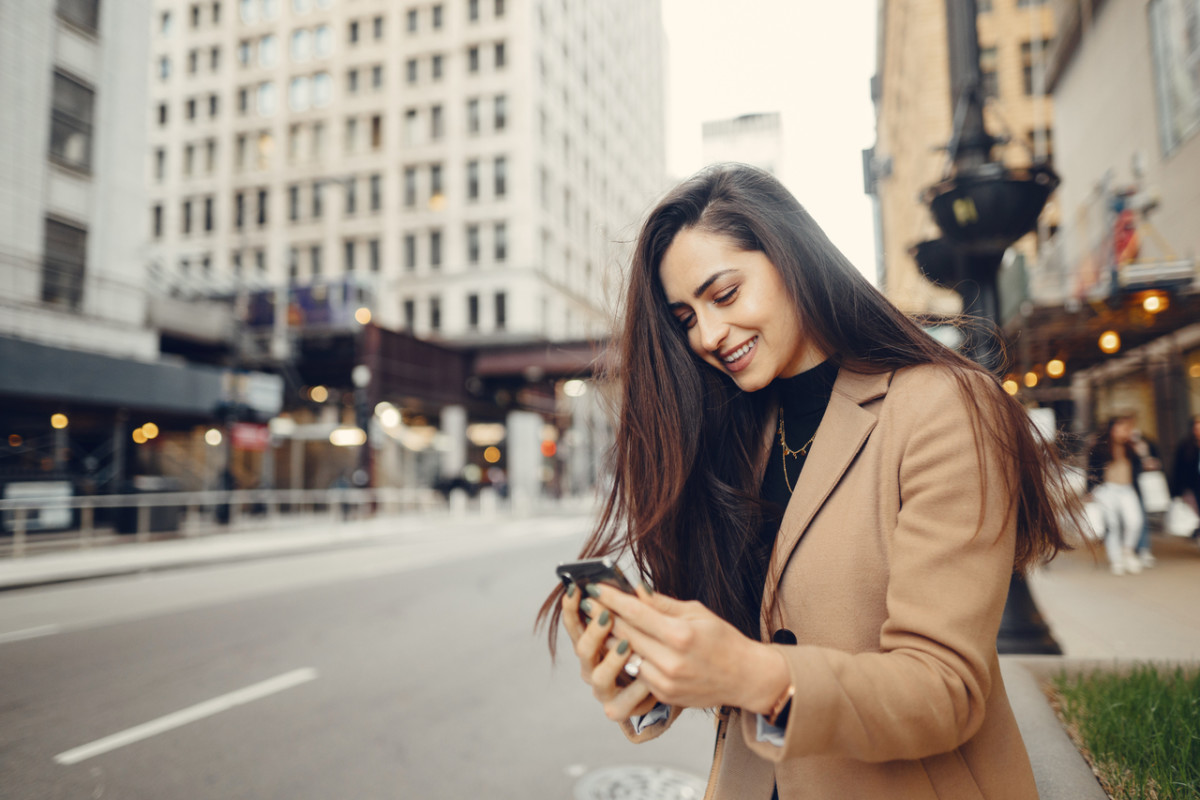 Girl with phone city