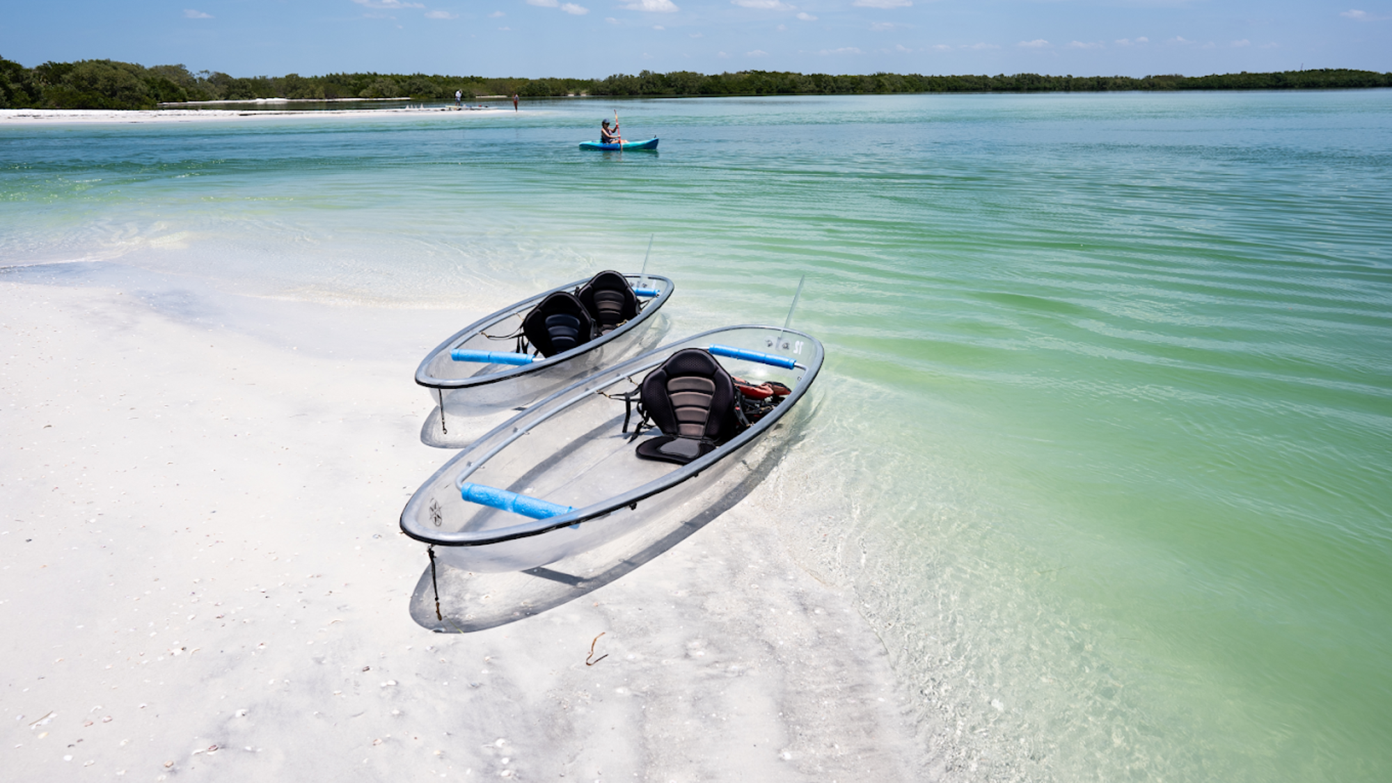 Clear kayaks at Shell Key Beach