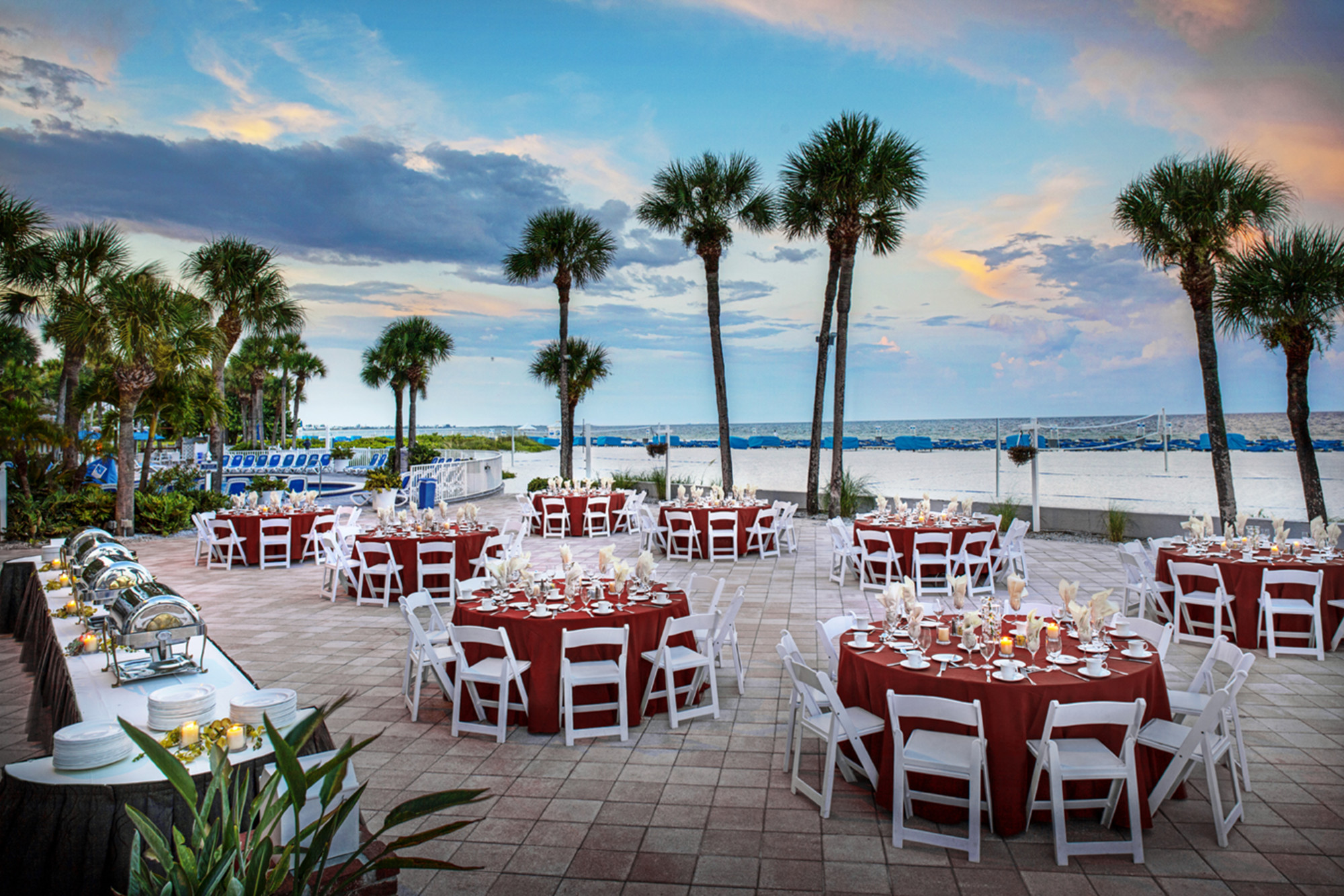 Breck Deck 2,200 sq. ft. deck steps away from the sand set with tables for an event