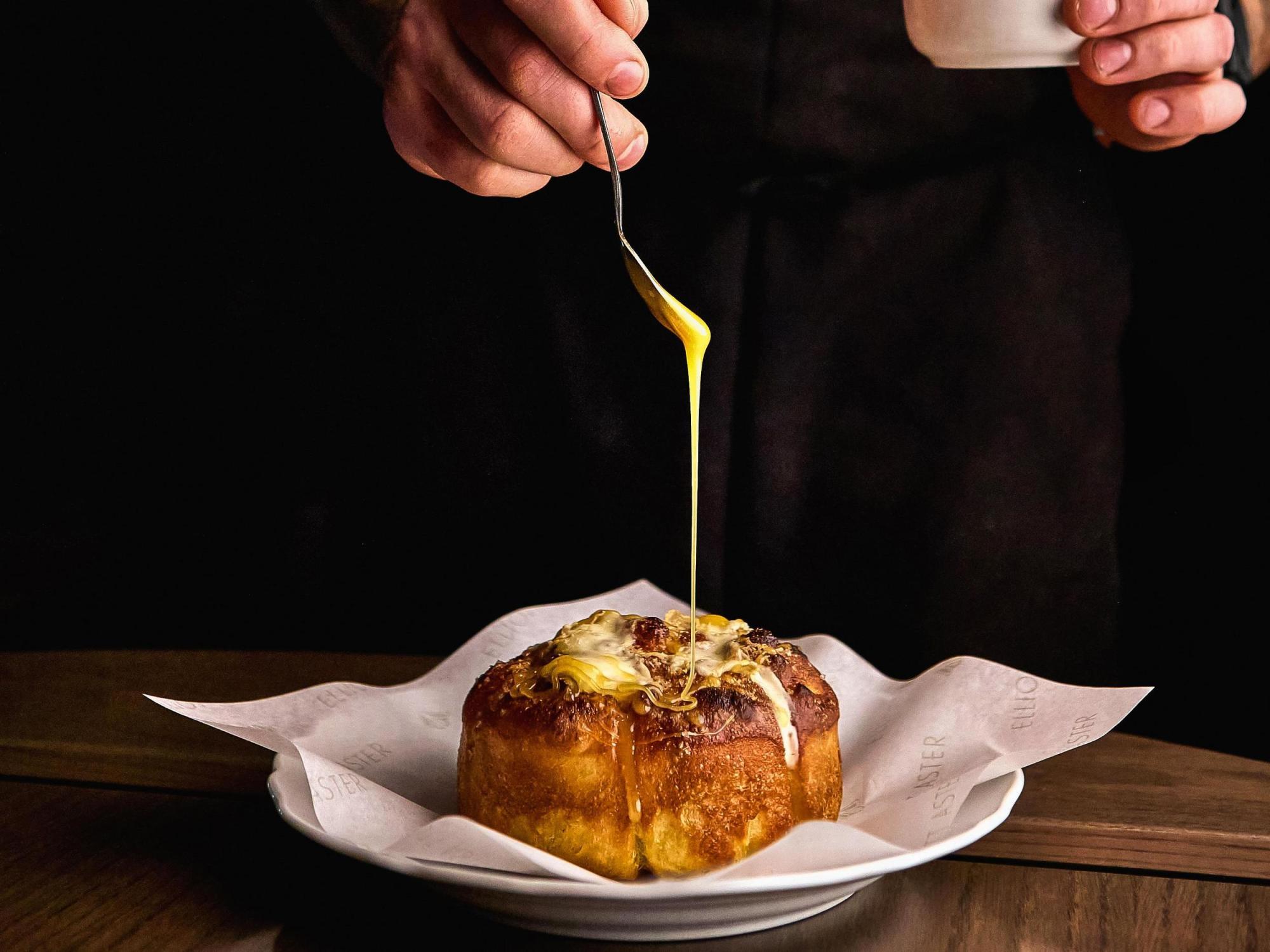 Bread with dripping sauce at Elliott Aster