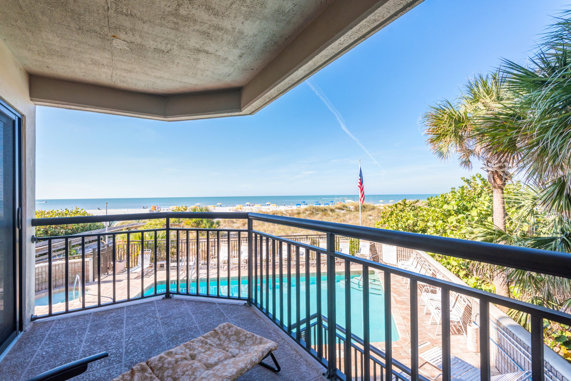 Balcony looking out to pool and Gulf of Mexico