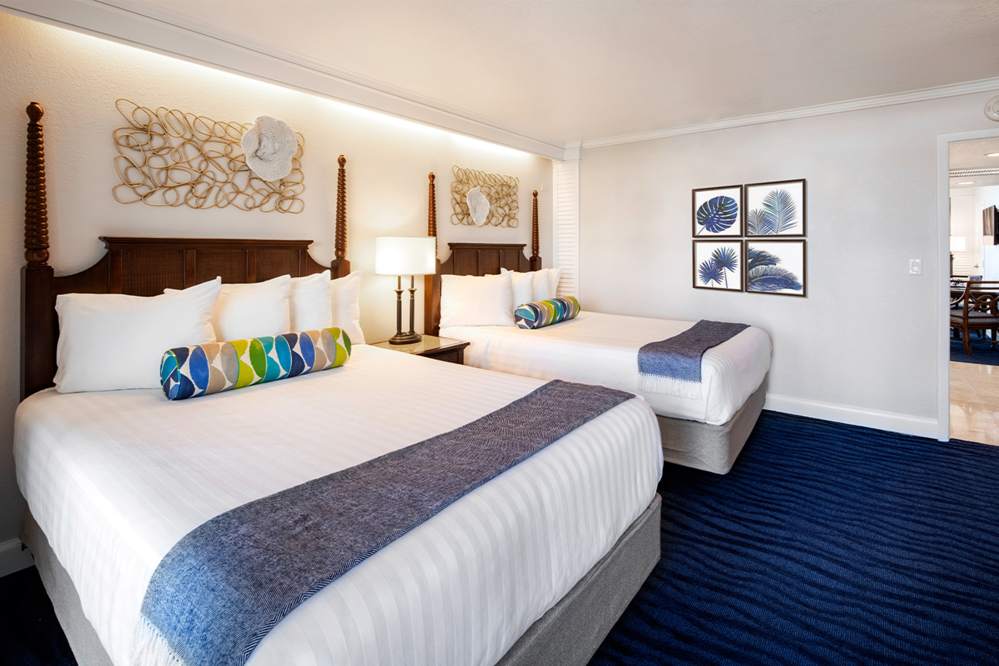Suite with two queen beds and bright, airy modern furnishings.