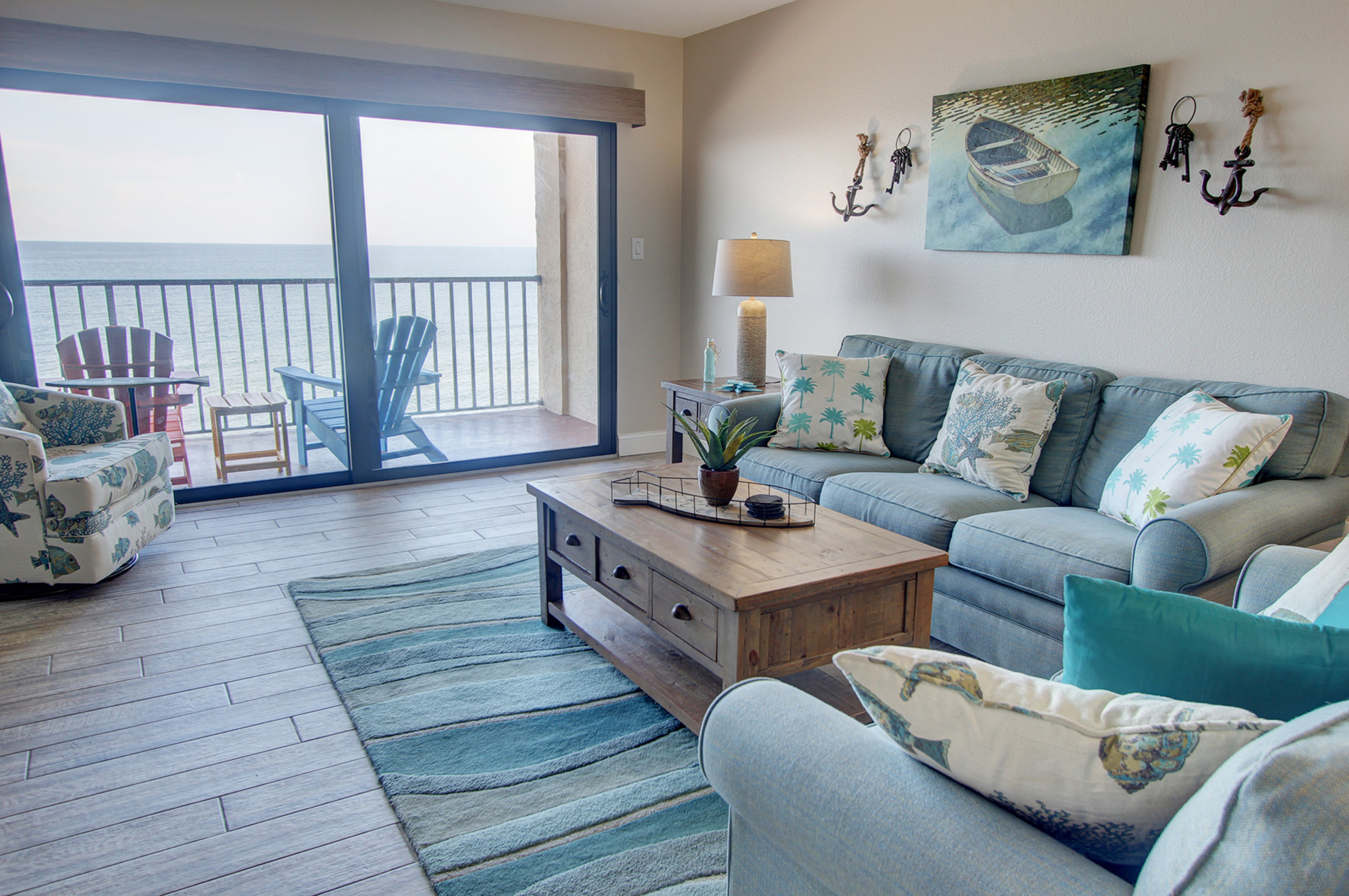 Living room in Gulf front vacation condo by TRS-Travel Resort Services
