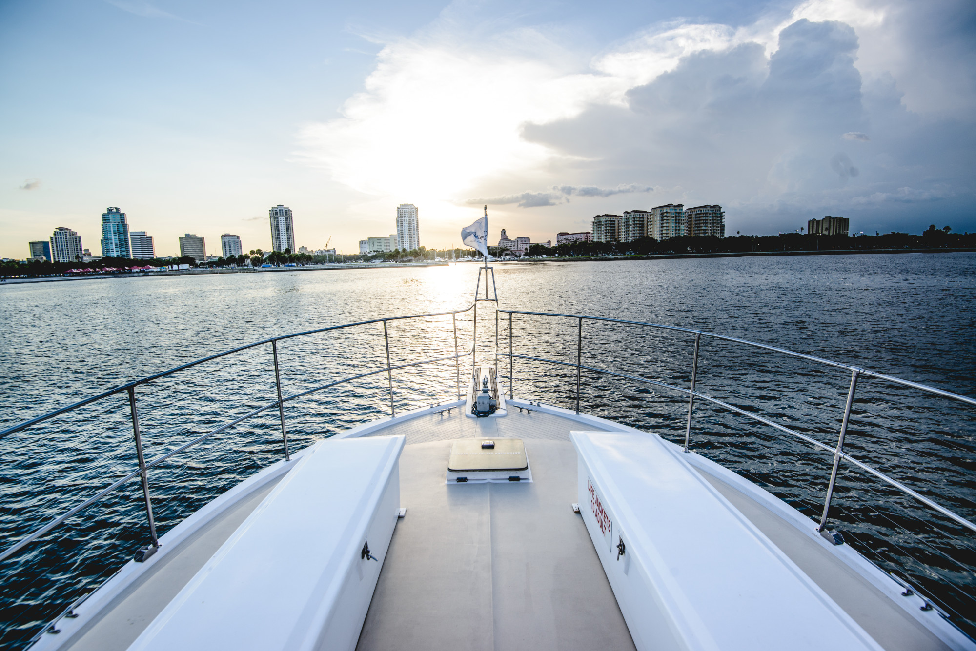 Enjoy the breeze in your hair and endless views while seating on the bow of this 43' luxury yacht