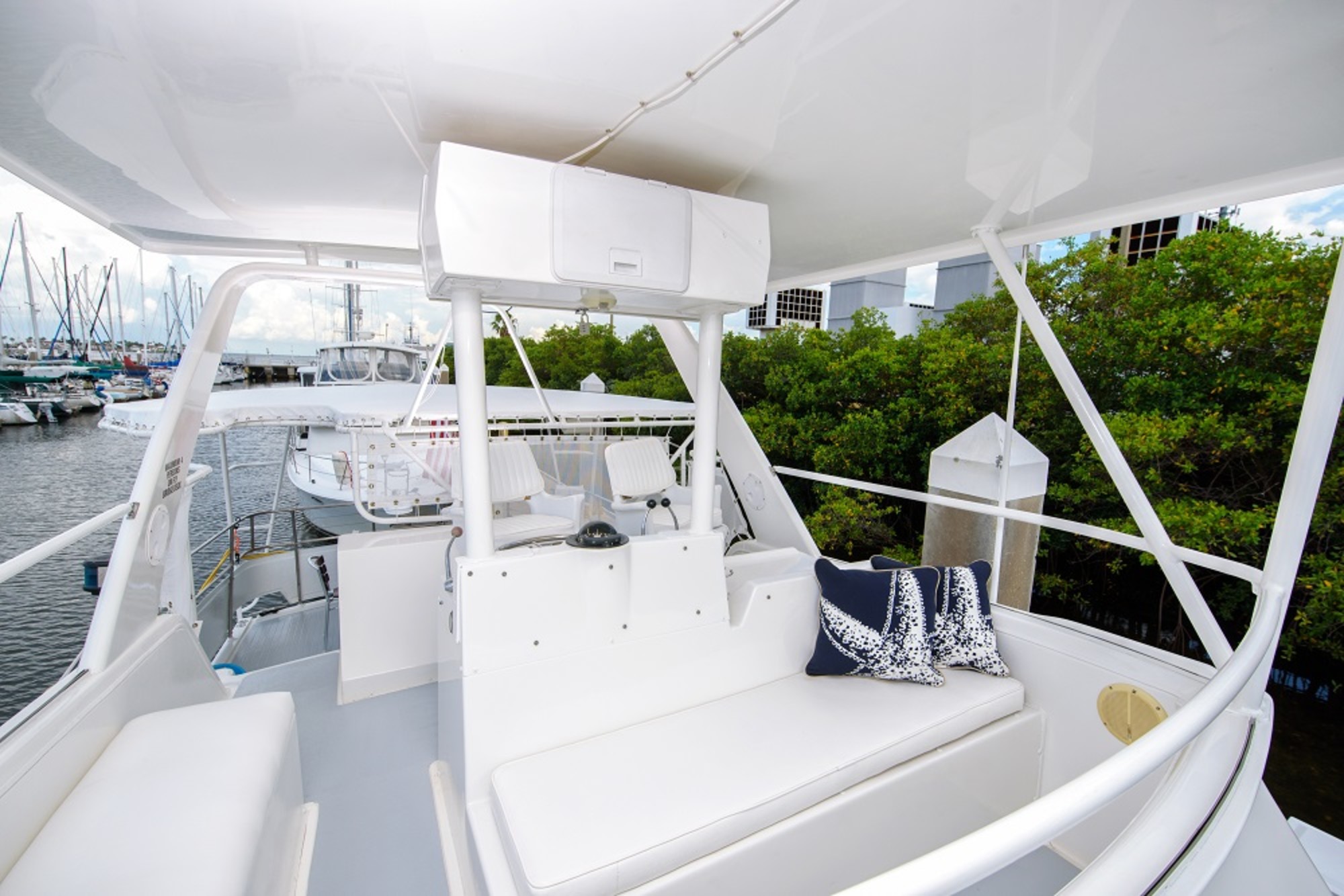 Relax on the covered captain's bridge and maybe even take a turn at the helm!