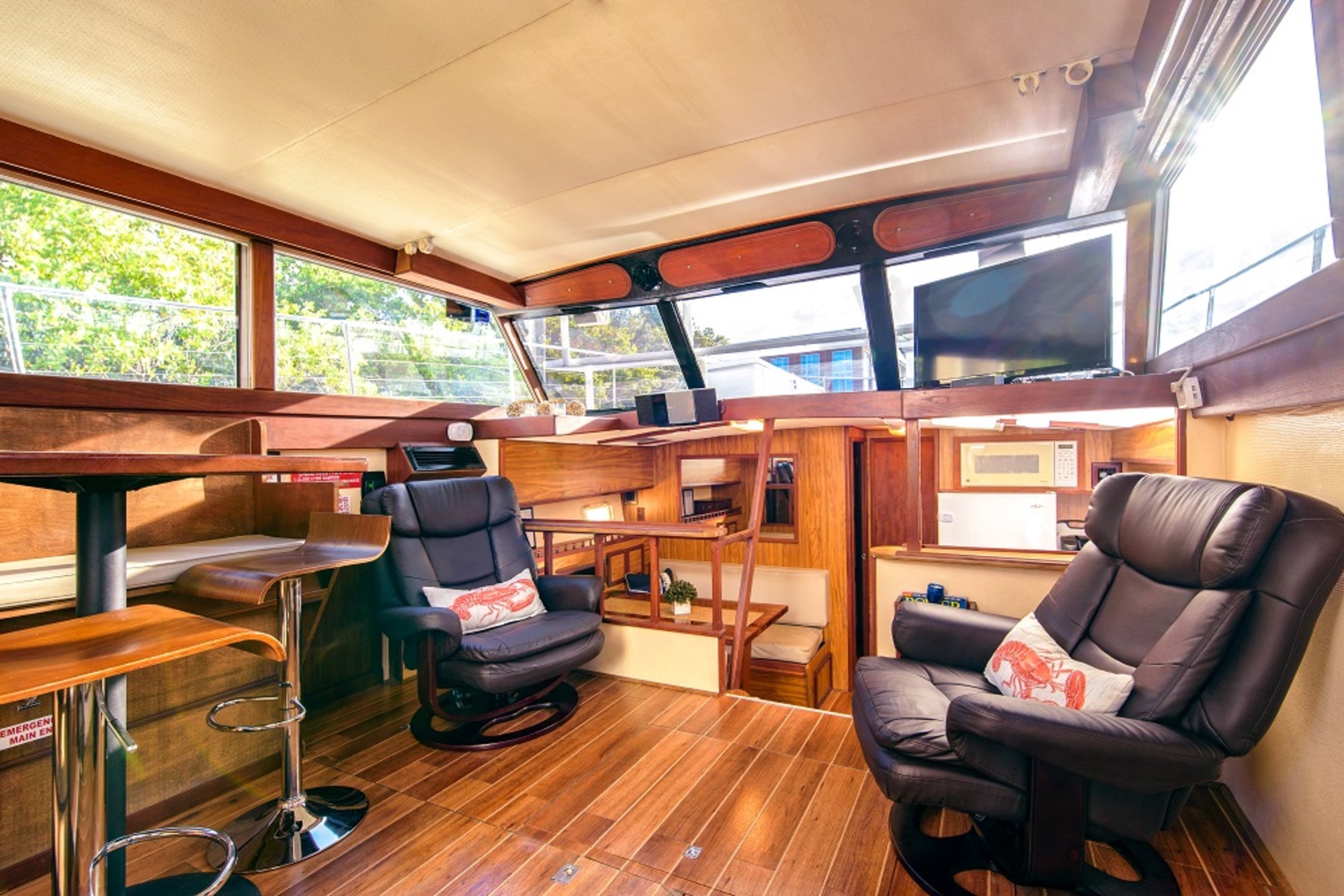 The Smooth C's has a spacious climate-controlled interior cabin with casual seating for 12
