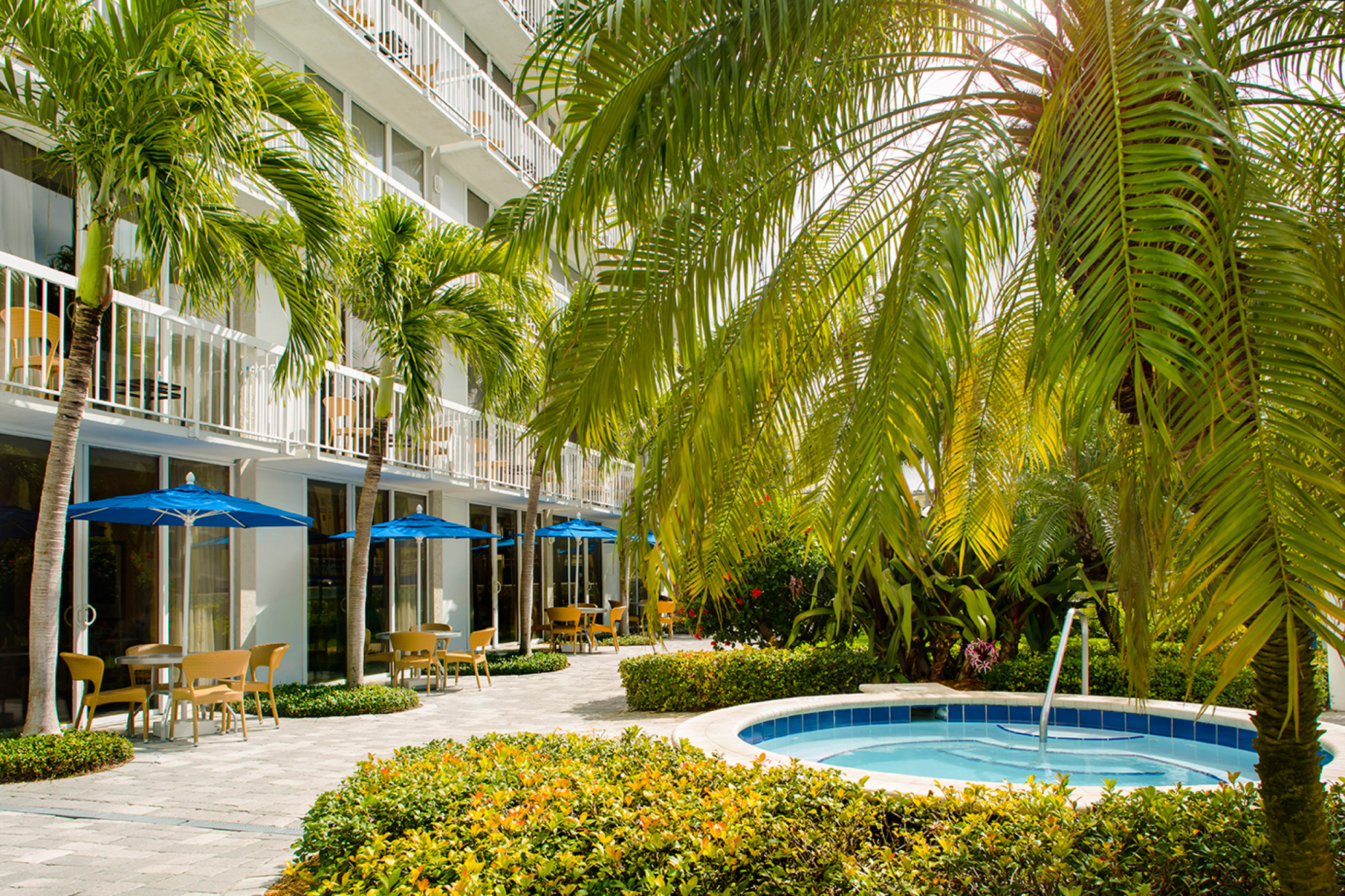 Relax in the Oasis Courtyard with adult-only pool and whirlpool.