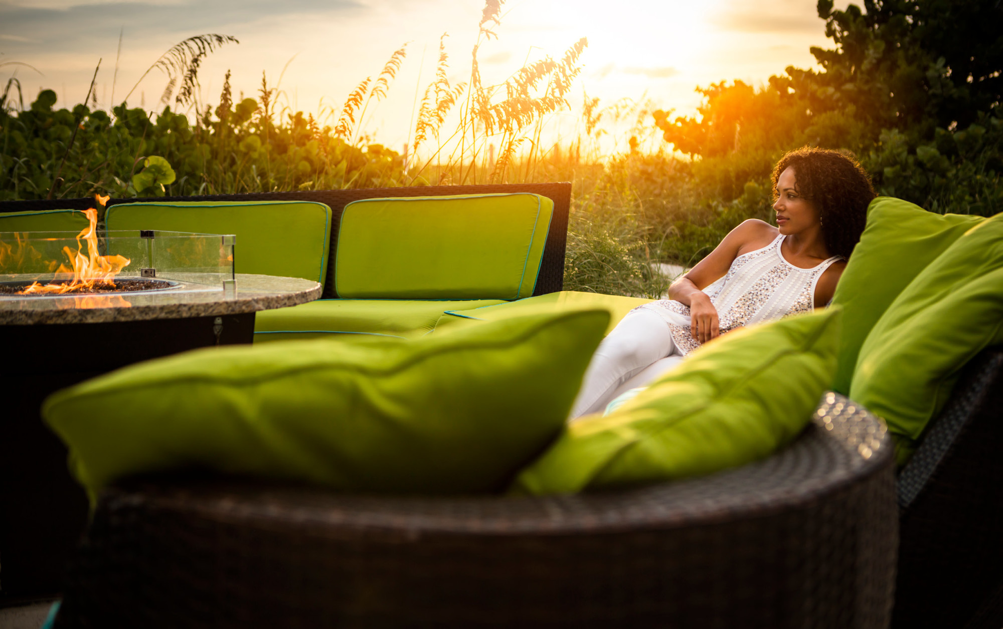 Unwind at The SandBox Beach Lounge with open fire tables