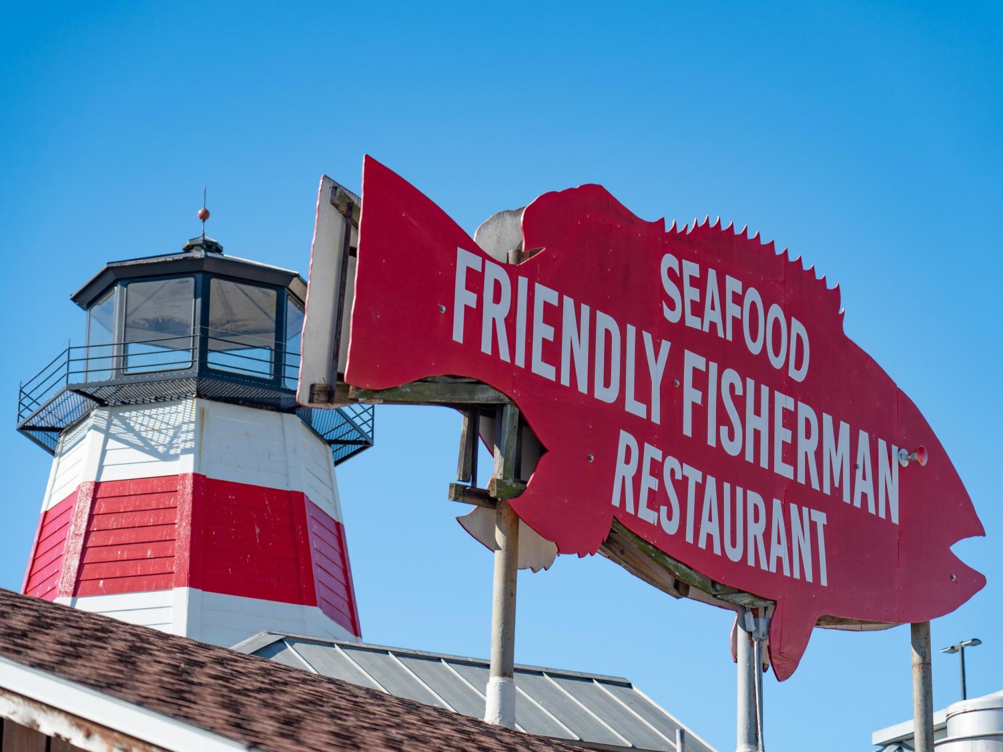 friendly fisherman sign