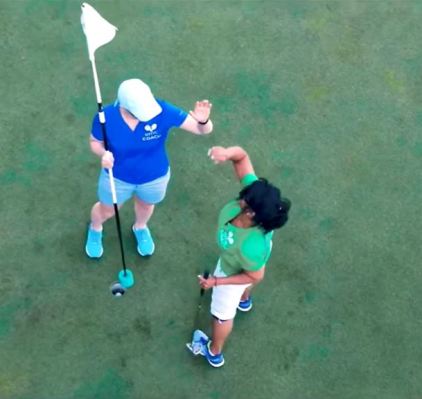 Twin-Lakes-Golf-and-RV-Resort-golfers-high-five