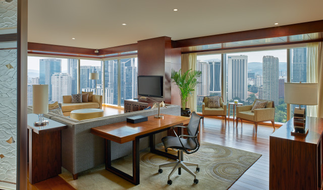 Grand Executive Suite - Living Area - Residentially styled 152 sq m suite with one king bed and a spacious living space. Includes dining area with a pantry and access to dedicated Grand Club lounge.