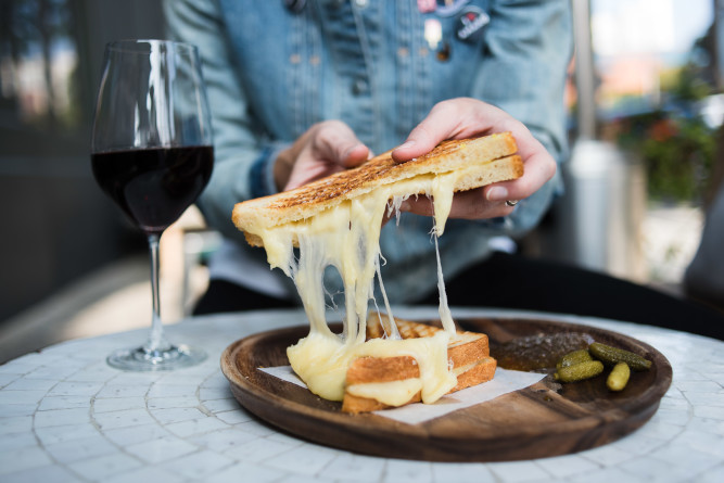 Our signature Grilled Cheese with wine
