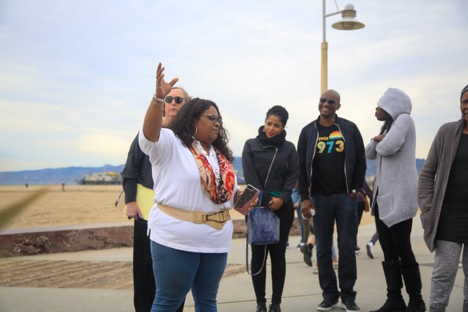 Robbie Jones giving tour on Santa Monica Beach