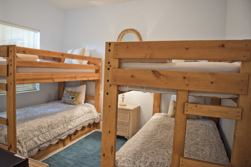 guest bedroom with 2 sets of bunk beds
