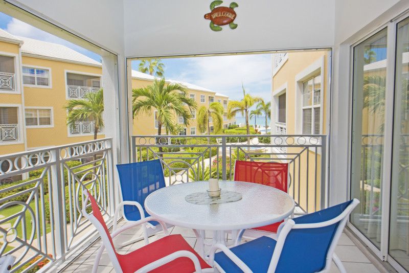 Screened in Patio with views to the pool and sea