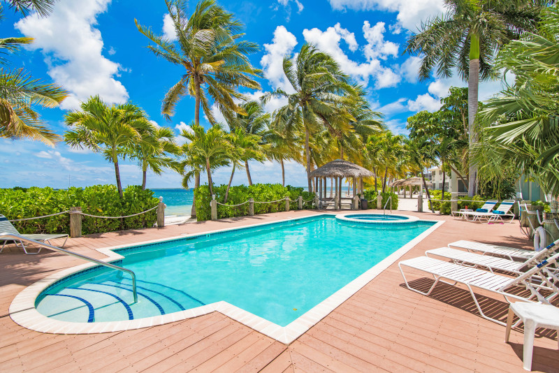 Complex Pool out to beach with a gazebo