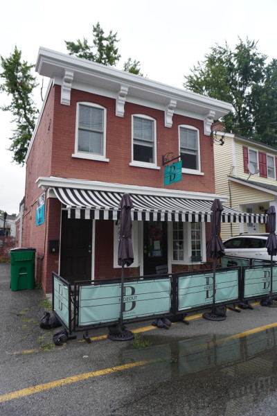                         Bert's Hideout is a cozy brick building tucked on a side street
                        