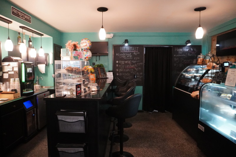                         The inside of Bert's includes a bar and bakery display case
                        