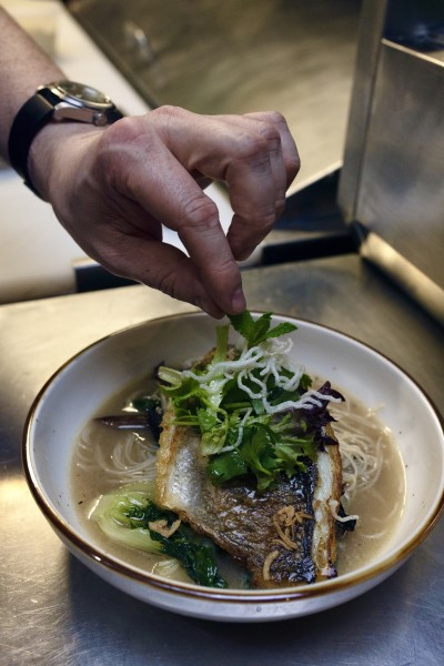 The careful plating of a seafo...