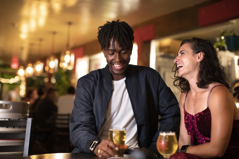                         Couple enjoying beer at King's Court Brewing Company in Poughkeepsie, NY.
                        