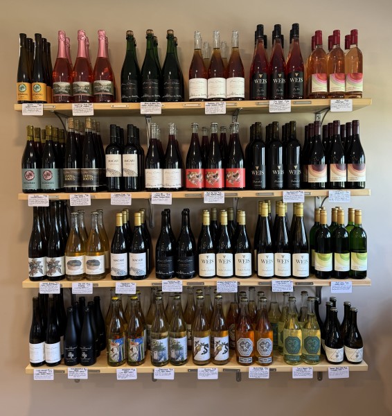                         A collection of wines displayed on shelves at The Cooper's Daughter Farm & Bottle Shop in Red Hook.
                        