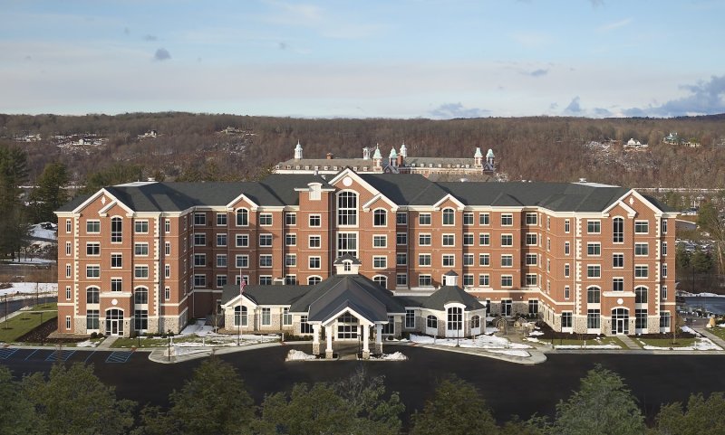 An exterior, aerial shot of th...