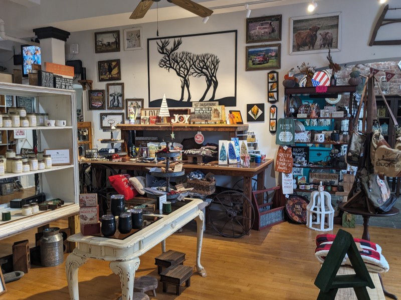                 T and M Rustic Home brims with candles, decor and more!
                