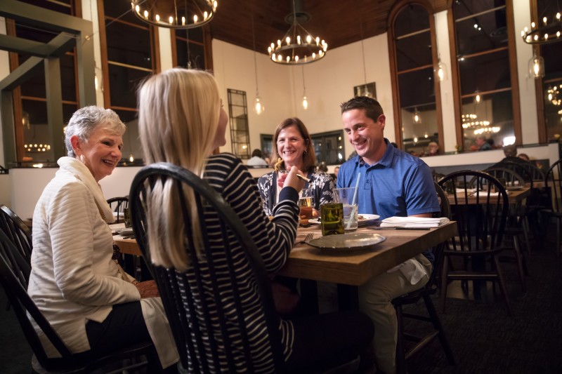                         Family dining at farm-to-table restaurant Terrapin in Rhinebeck, New York.
                        