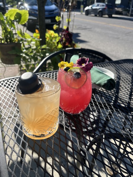                         Two cocktails sitting on an outdoor table at Willa in Millerton.
                        
