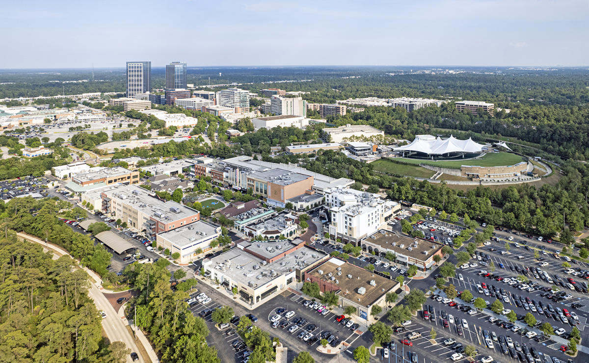 Aerial view of The Woodlands Waterway with restaurants and walking paths