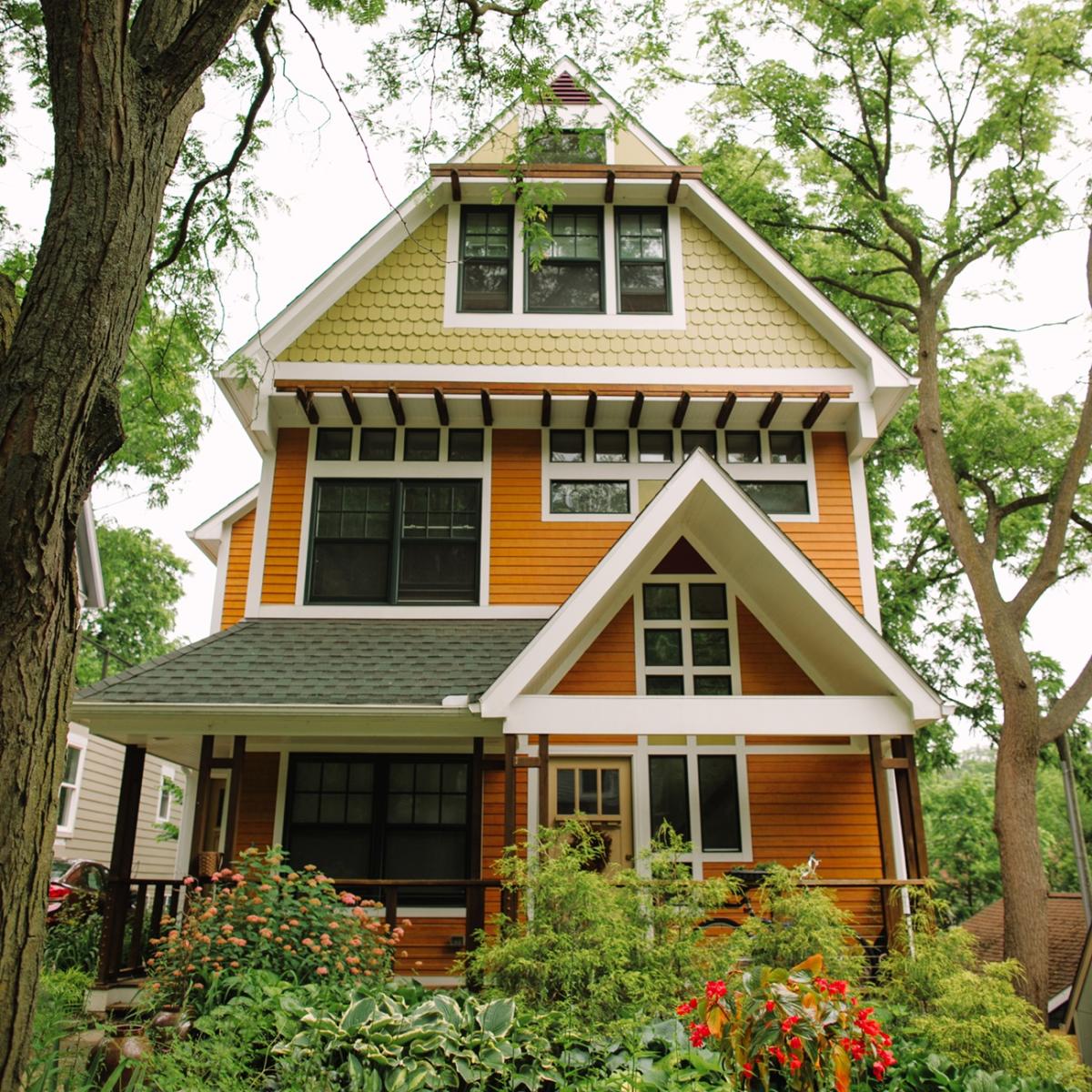 Exterior of Baxter House Bed and Breakfast beneath mature trees in Ann Arbor