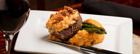 Filet served with sweet potatoes and asparagus