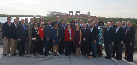 Group photo of elected officials and community leaders at Cruise Terminal 29