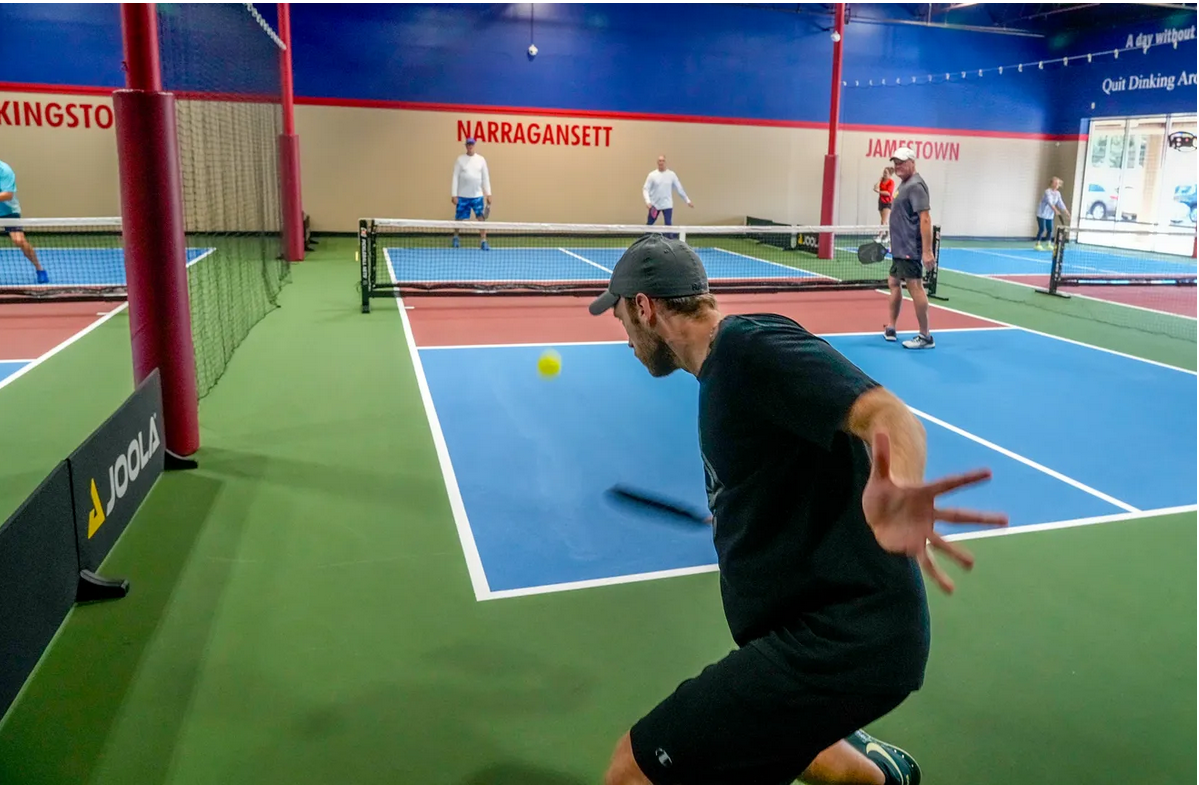 Indoor pickleball is coming to a court near you. Here's how to play in