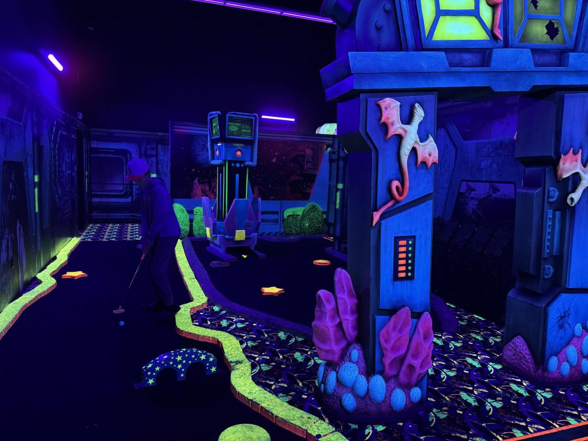 Glow in the dark mini golf at Fat Cats