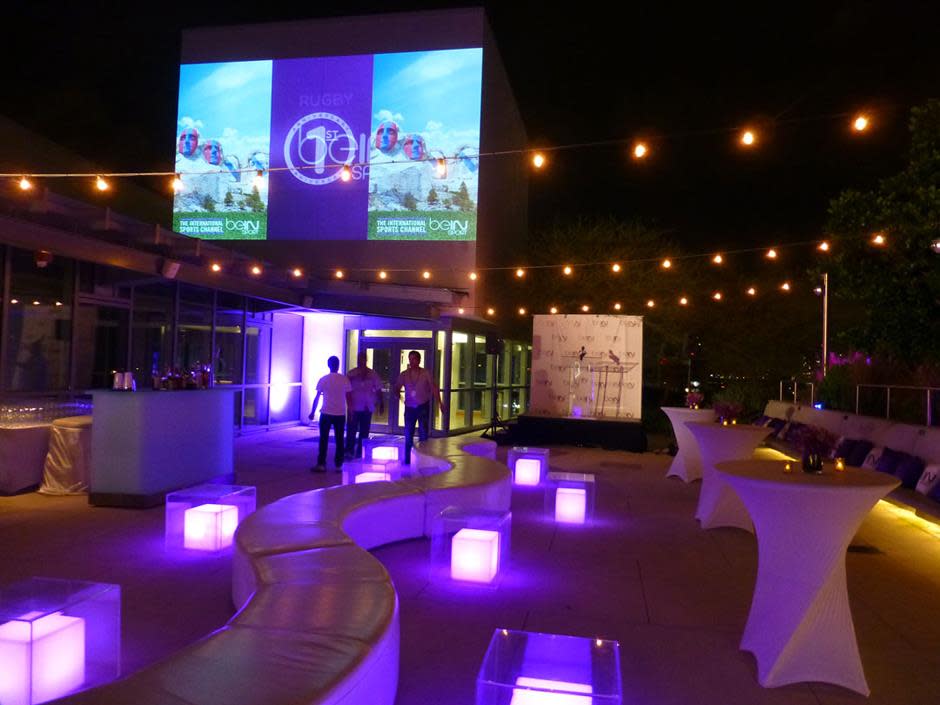 Rooftop Garden Featuring Accent Lighting Stage and Video Projection