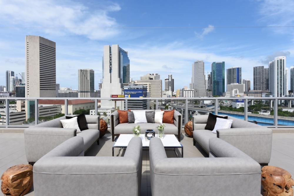 Penthouse Lounge Group Soft Seating overlooking Miami Skyline