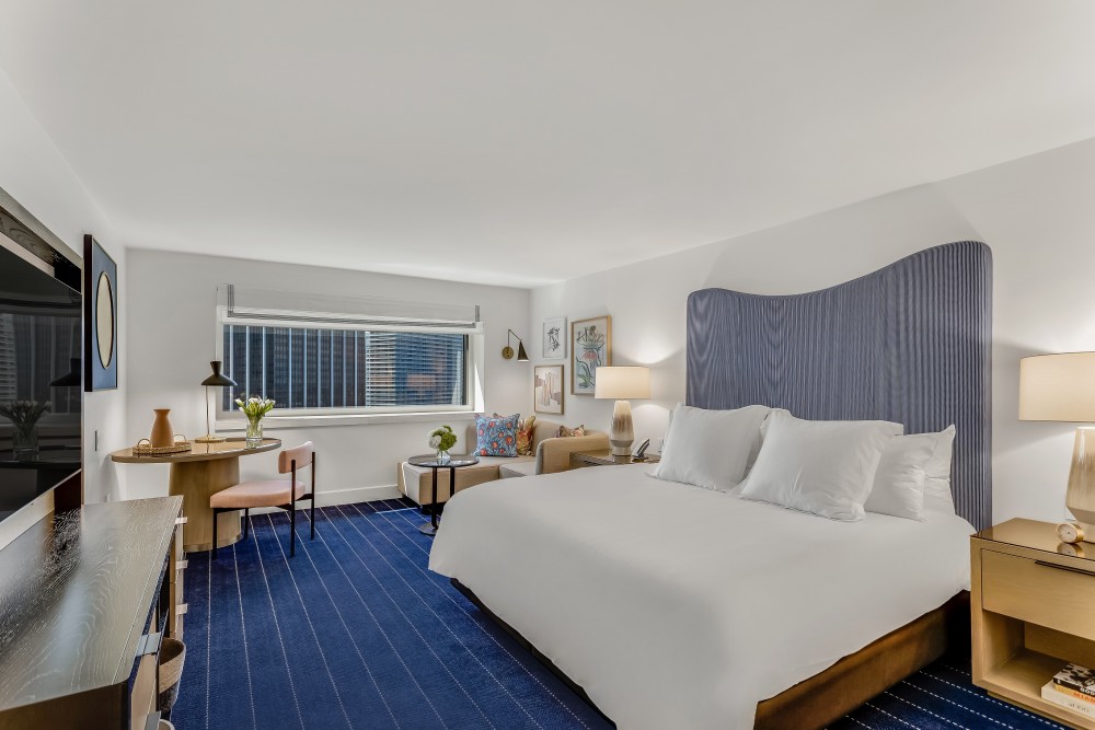 The Skyline View King room ft. a plush king bed, modern seating, power blackout shades and a newly redesigned bathroom, a Nespresso machine & more.