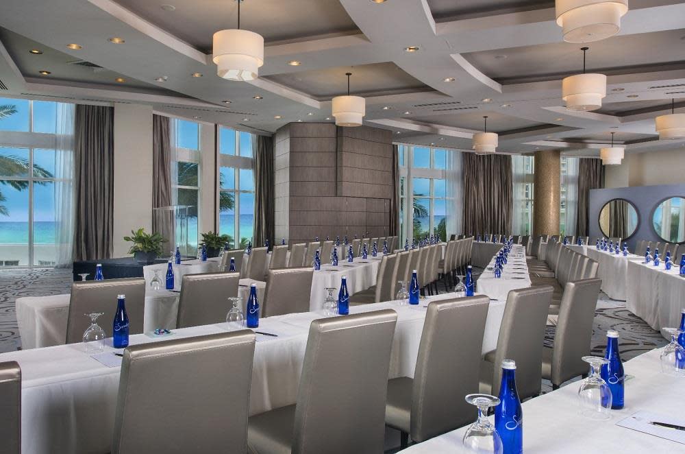 Ocean Ballroom with floor to ceiling windows set for conference.
