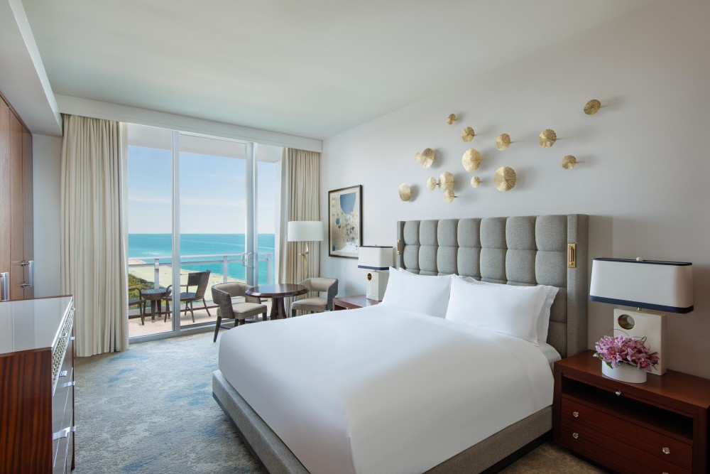 Oceanfront guest rooms feature floor-to-ceiling views of the Atlantic and Haulover Cut.