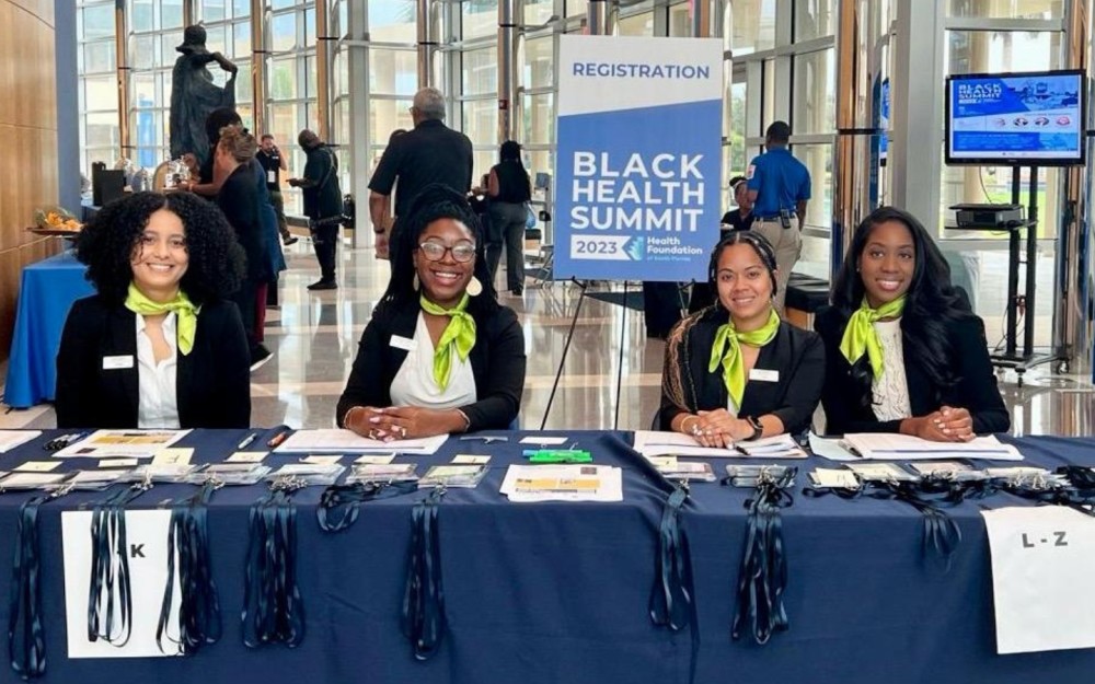 Anfitriones de registro de la Cumbre de Salud Negra