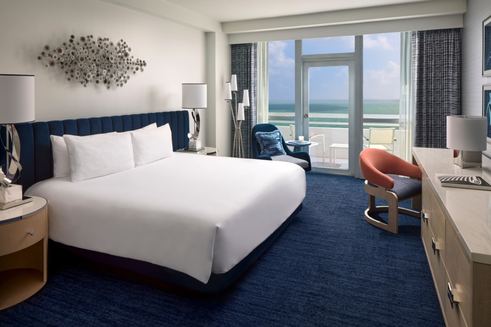 Admire Miami’s white sand beaches and sea breezes from your fashionably furnished balcony