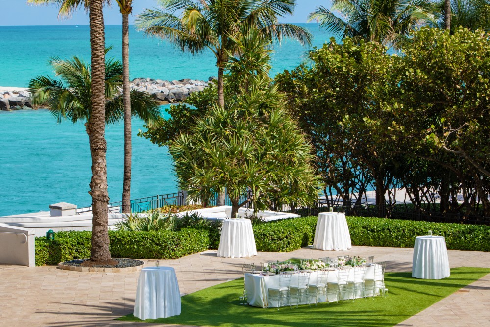 Elevate your celebration with a picturesque waterfront lawn event space.