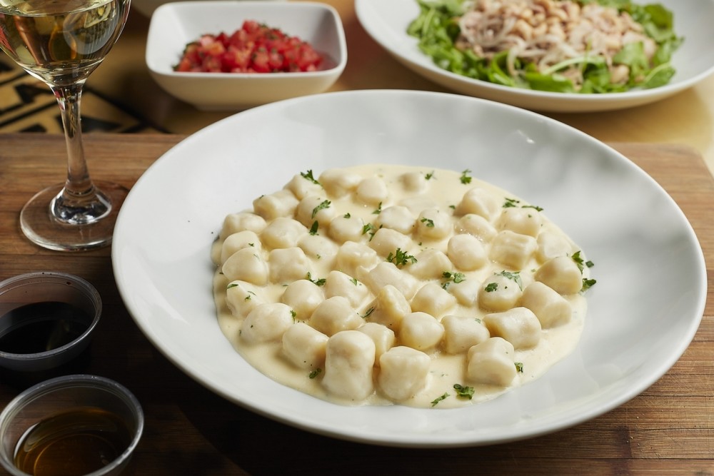 Homemade gnocchi with four cheese sauce