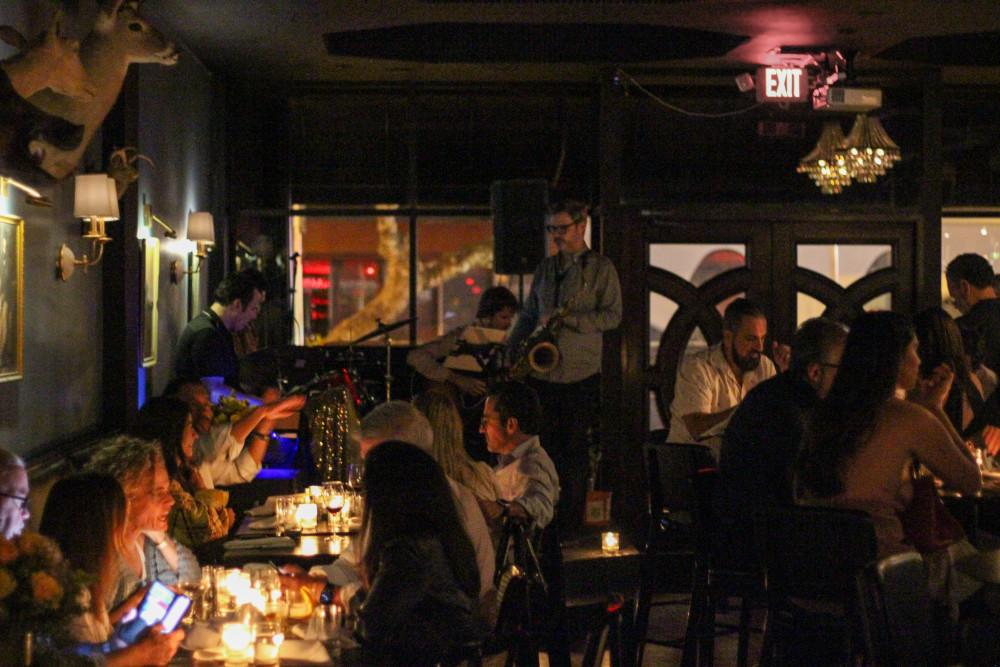 The Gibson Room is a dimly lit, cozy tavern, restaurant and bar that has live music five nights a week and serves late night food.