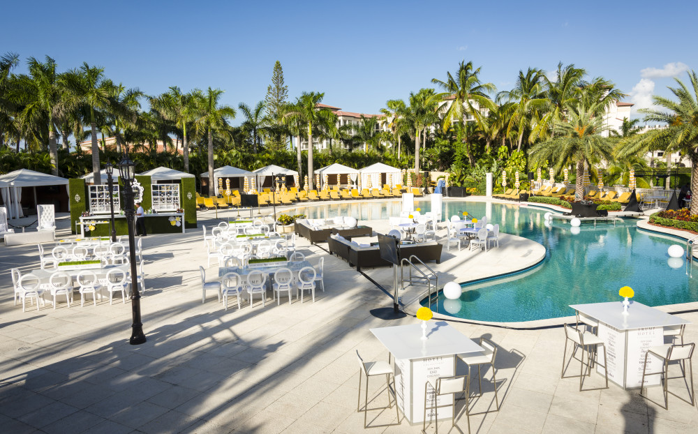 Royal Palm Pool offers an expansive pool deck perfect for memorable events with a tropical setting surrounded by lush landscapes and private cabanas. The outdoor venue accommodates up to 1,000 guests for a reception and 600 for banquet functions.