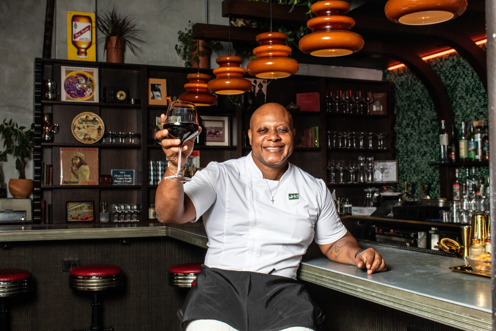 Chef Wayne Sharpe sitting at the Mangrove bar.